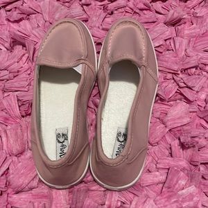 A pink slip on shoes